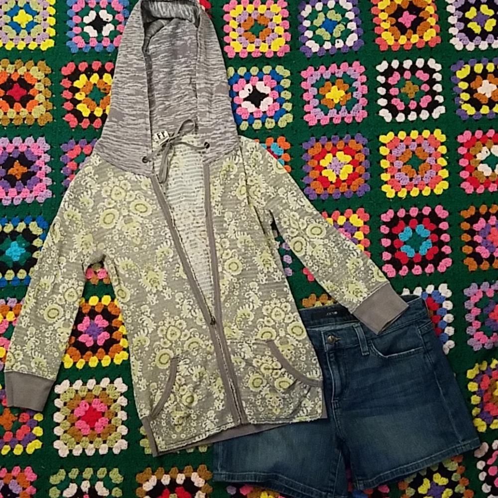 Free people hoodie runs small size Large